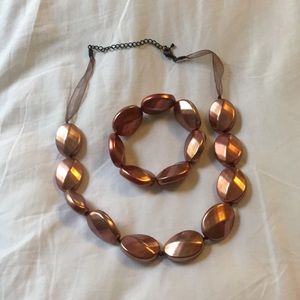 Matching necklace and bracket set